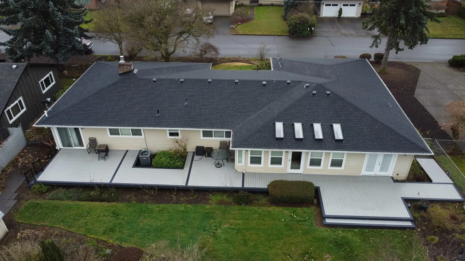 Drone aerial of the Camas, WA roof replacement - overhead view of the finished roof, view 4
