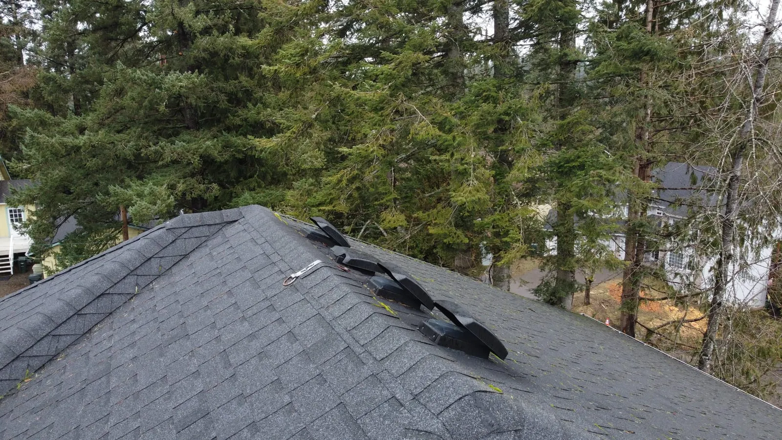 Drone aerial of the Camas, WA roof replacement - house with new roof and copper-finish gutters, view 9