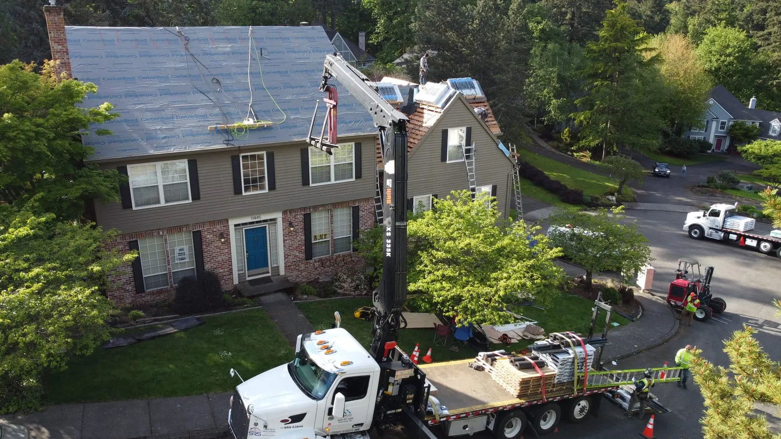 Drone aerial of the Vancouver, WA full-exterior remodel - wide elevation showing new Hardie siding, view 3