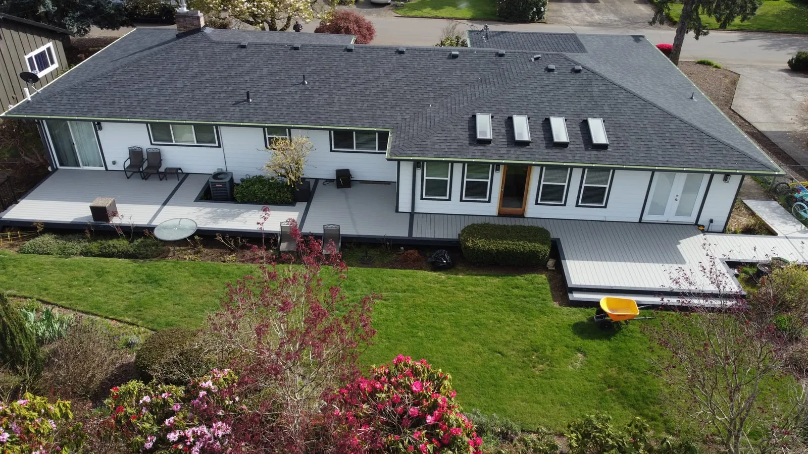 Drone aerial of the Vancouver, WA Hazel Dell roof replacement - finished gutter system, view 5