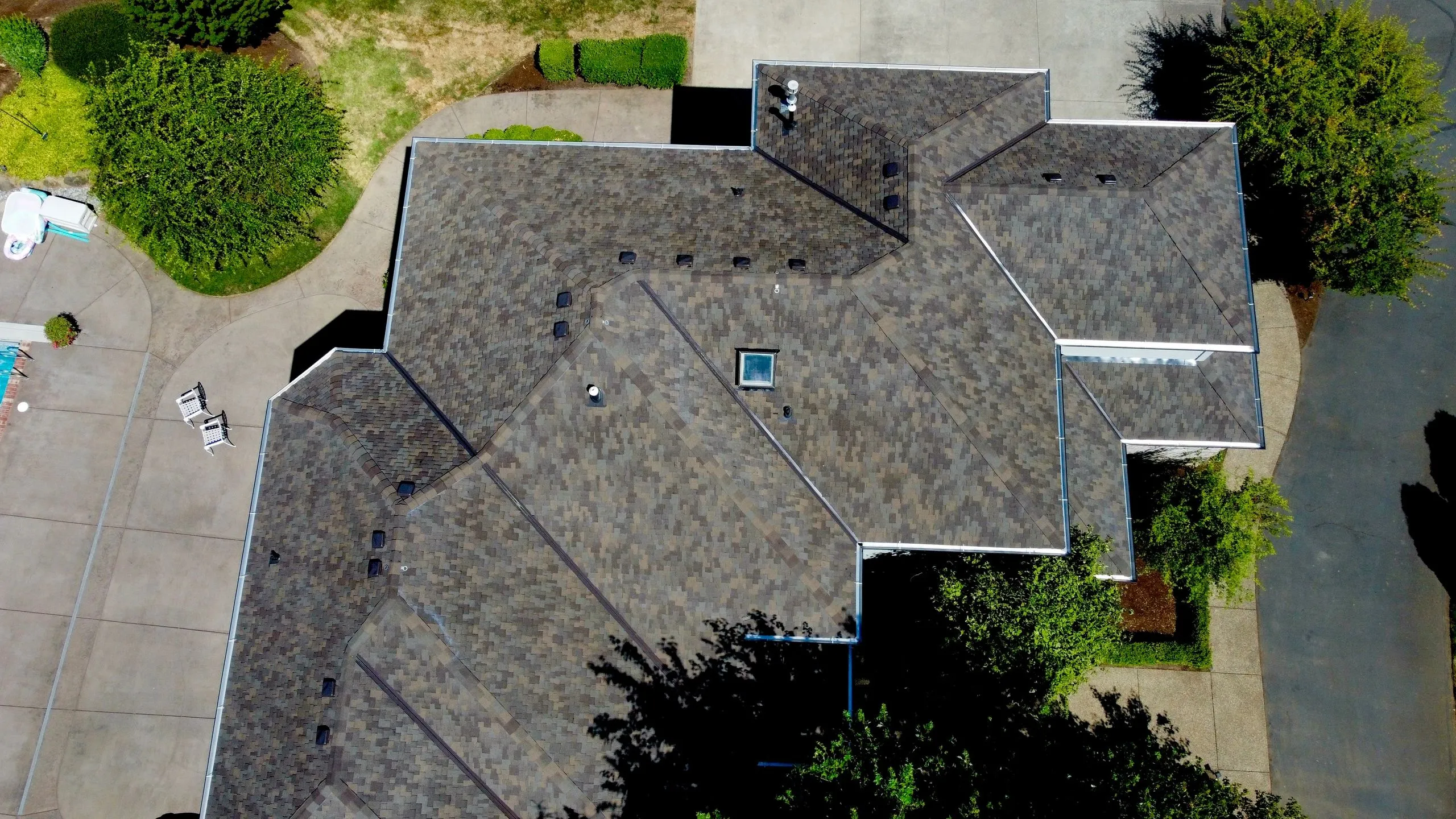 Drone aerial of a Washougal WA mountain home with new architectural shingle roof