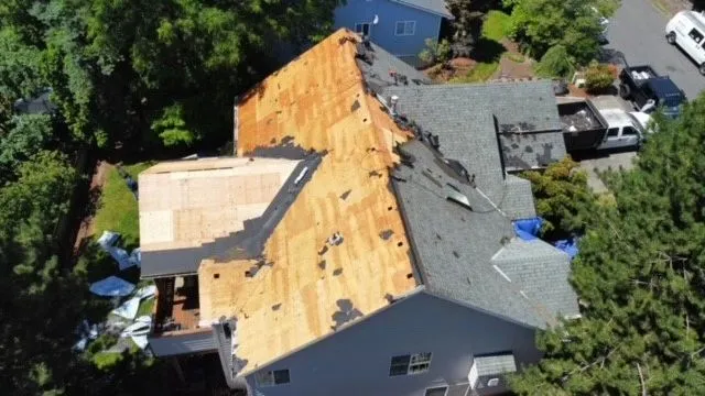 Cedar shake roof tear-off in progress on a Clark County, WA home